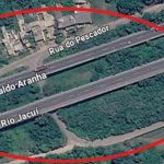 Alagamento fecha acessos sob a ponte do Rio Jacuí, em Porto Alegre